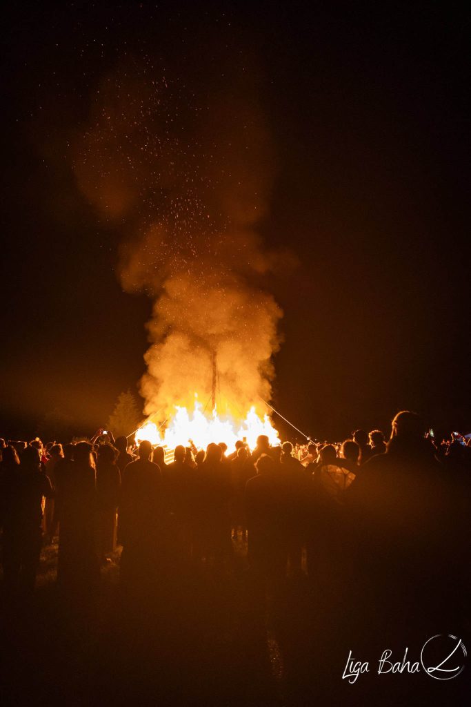Sacred fire ritual during the Latvian solstice night.