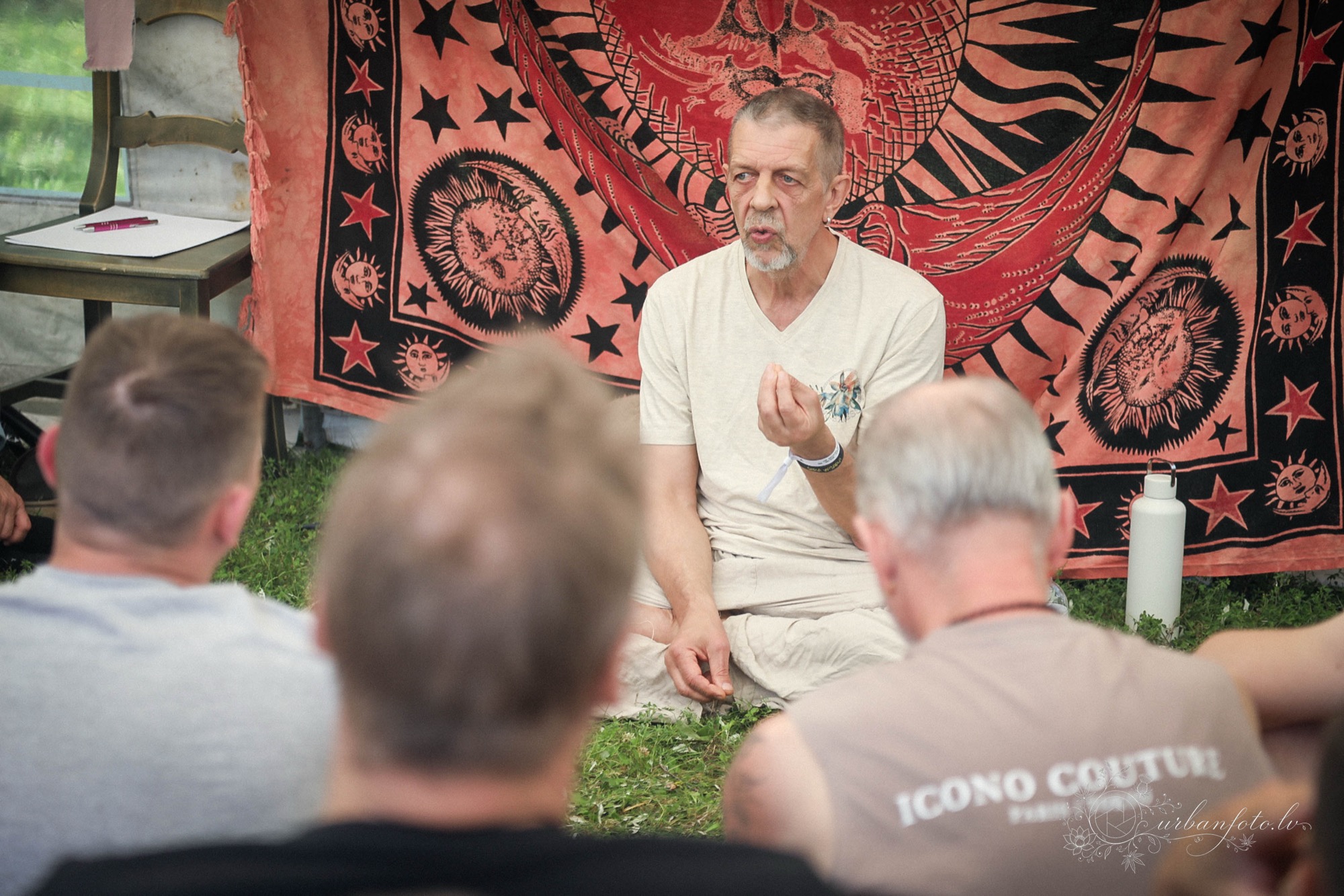 Juris Grave leading a men's circle at Būtība festival