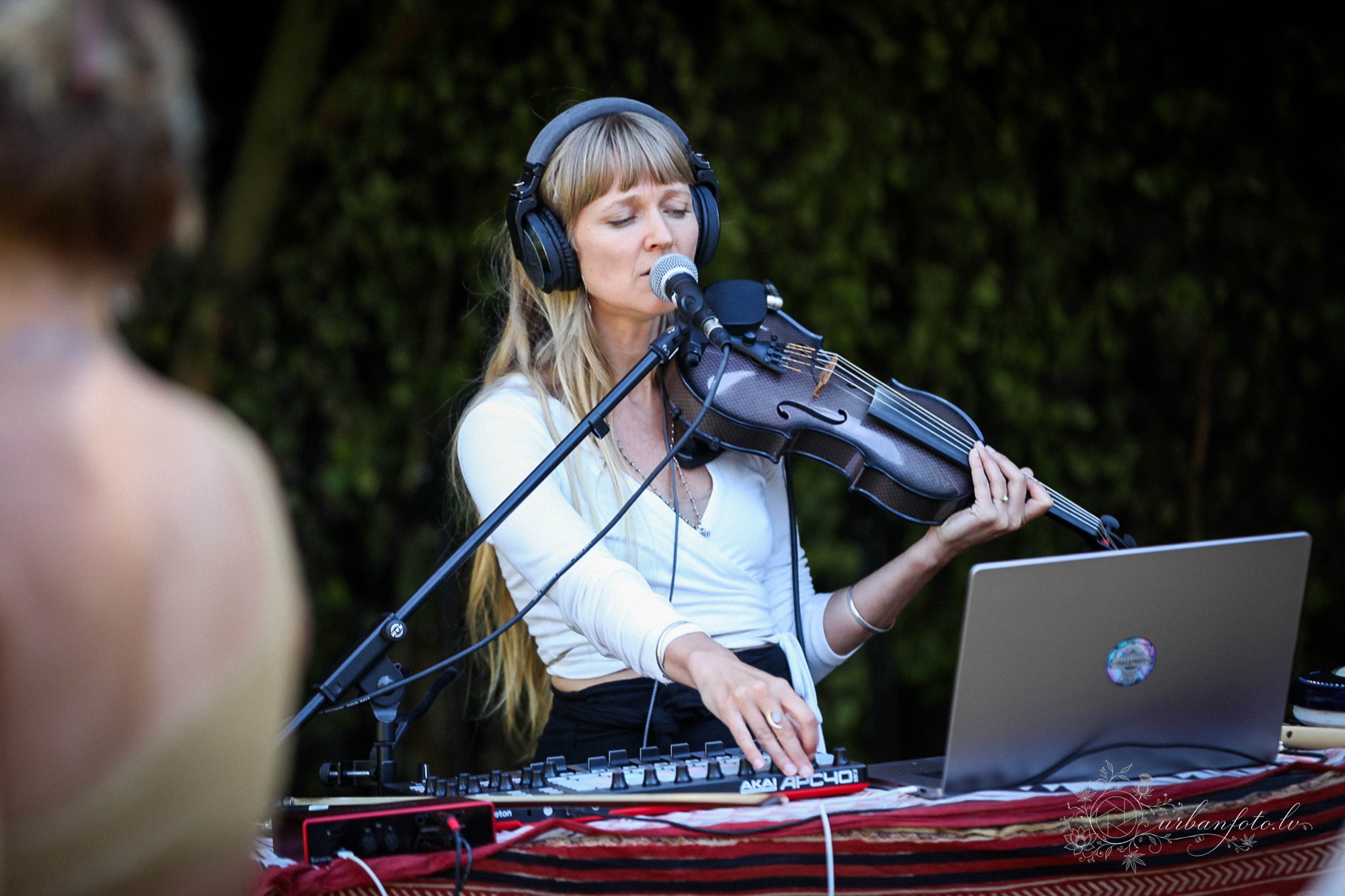 Sarasvati Dasi performing violin and live electronic music during her ecstatic dance set at BŪTĪBA Festival 2026.