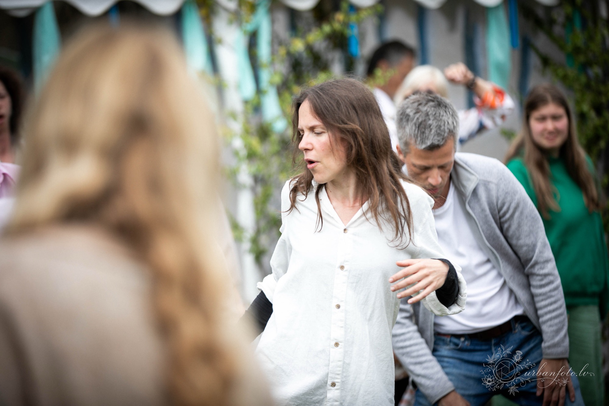 Dana Indane Surkiene leading a movement and voice practice among festival participants at BŪTĪBA Festival 2026