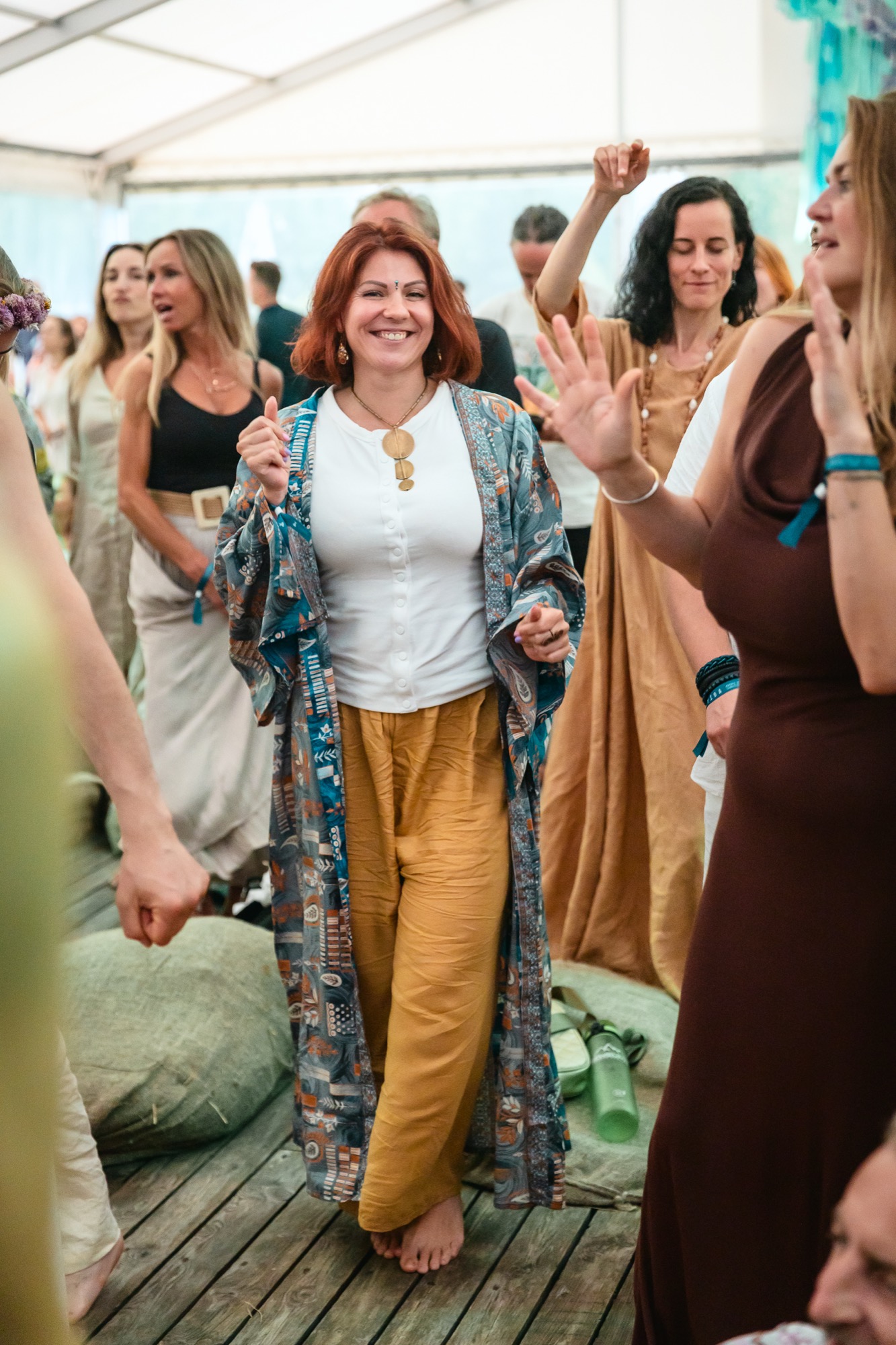 A joyful dance floor at BŪTĪBA Festival 2026, where smiles shine, bodies move freely and strangers become a community.