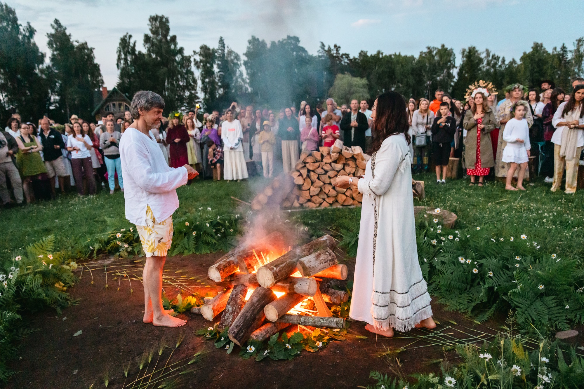 BUTIBA Festival 2026 participants gathered around a ceremonial bonfire during a summer solstice ritual