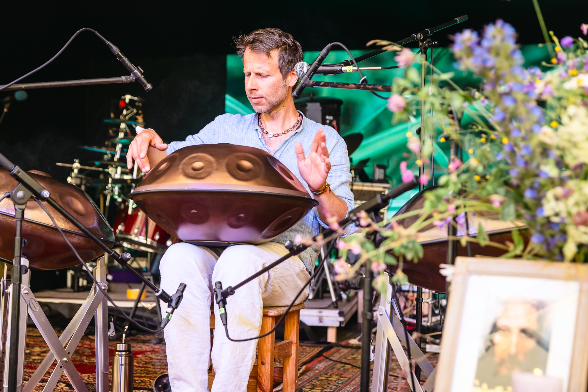 Alwin Klein on the hang drum, weaving hypnotic rhythms and vibrant energy into the atmosphere of BUTIBA Festival 2026.