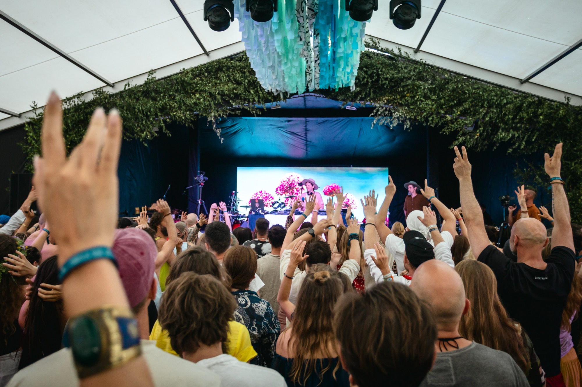 BUTIBA Festival 2026 audience raising their hands during a live music performance by Mose