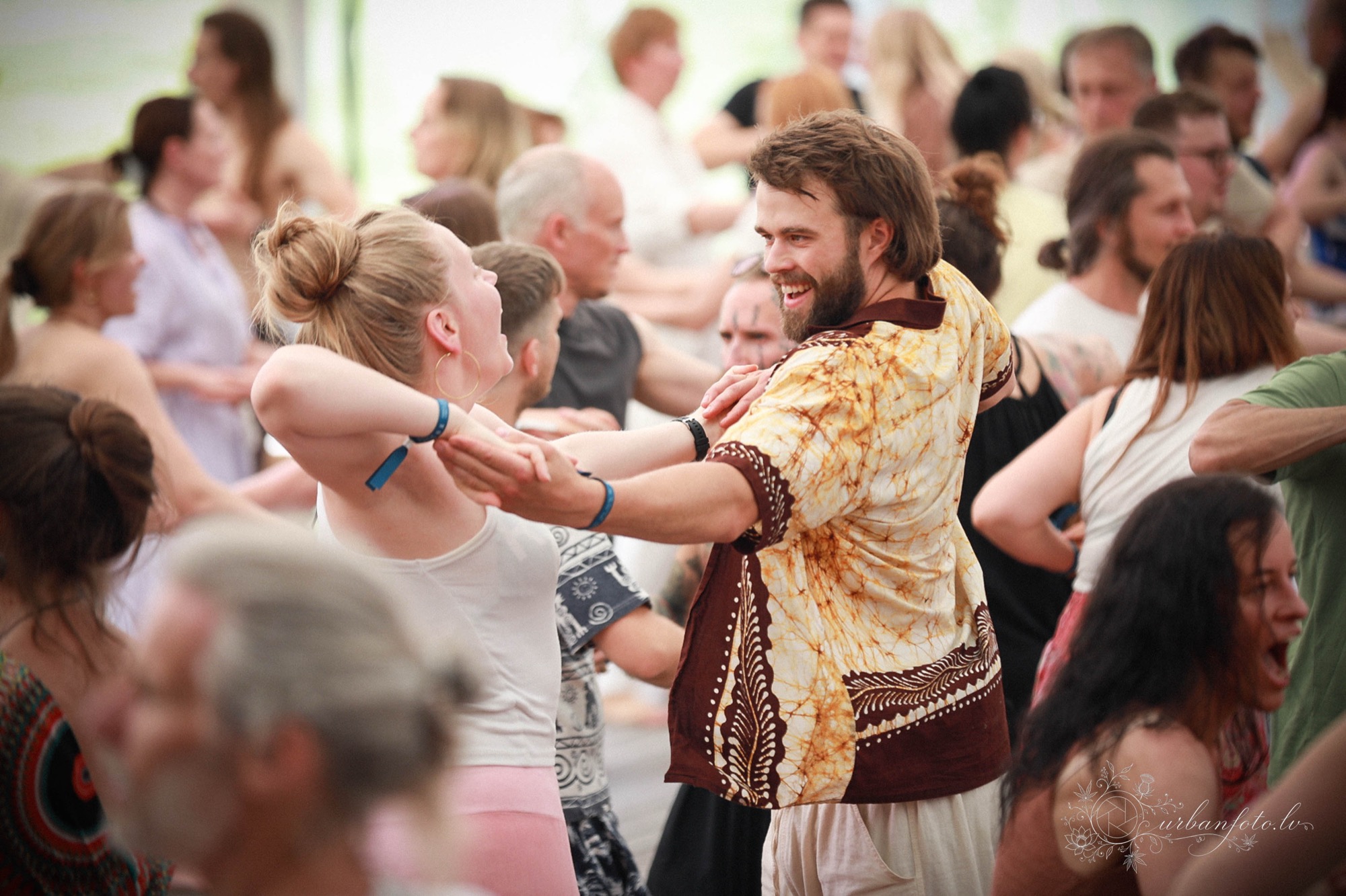 Participants exploring movement and connection during a Pulsations workshop at BŪTĪBA Festival 2026