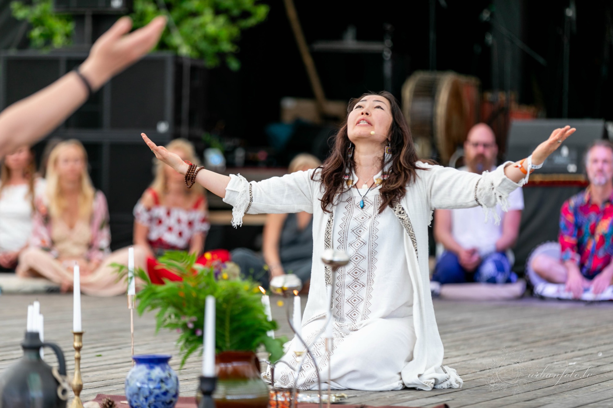 Opening ceremony at BŪTĪBA Festival 2026 led by Premal Madina, welcoming participants with a ceremonial gesture