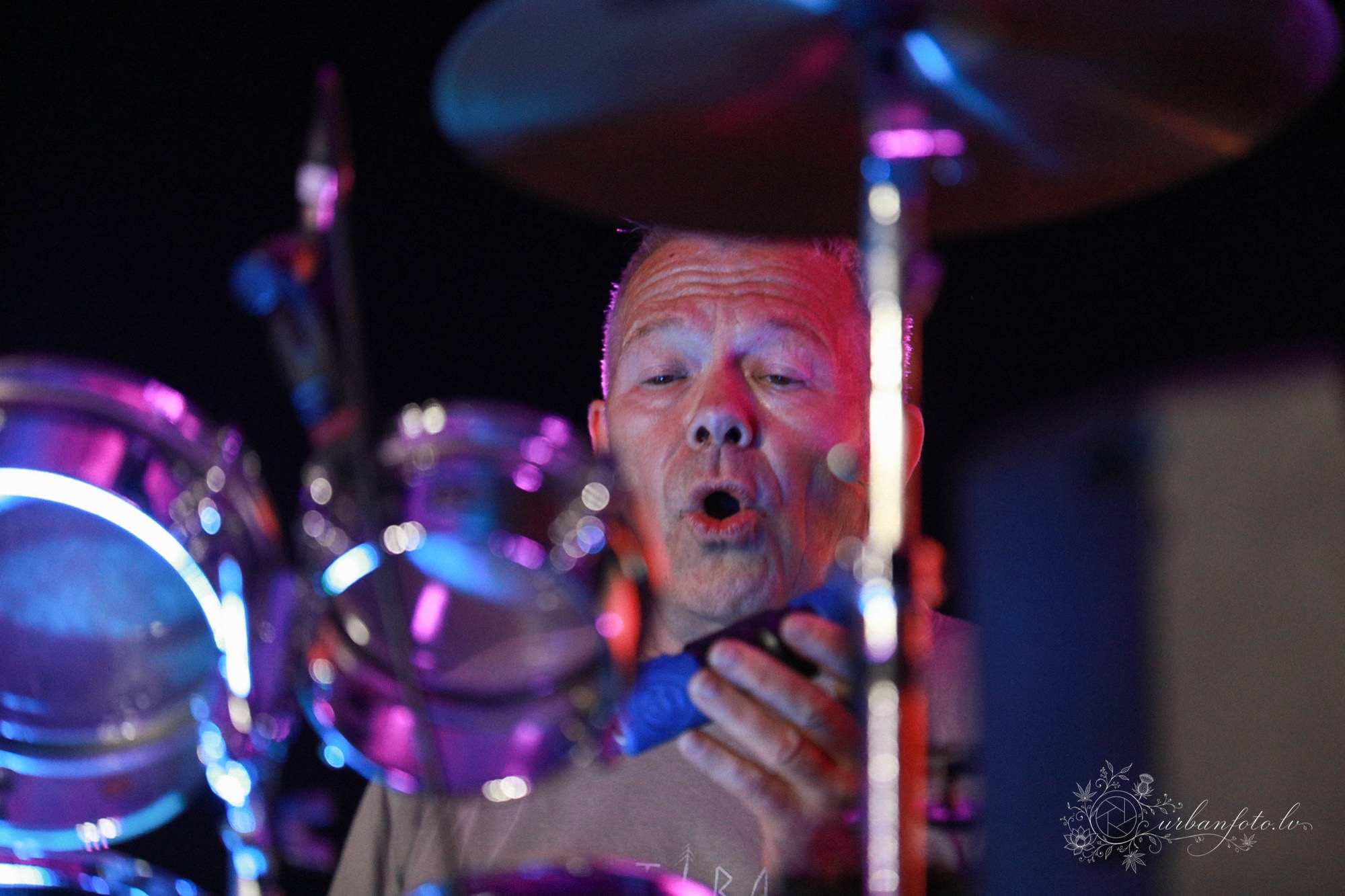 Rishi performing live percussion during a trance dance event at BŪTĪBA Festival 2026