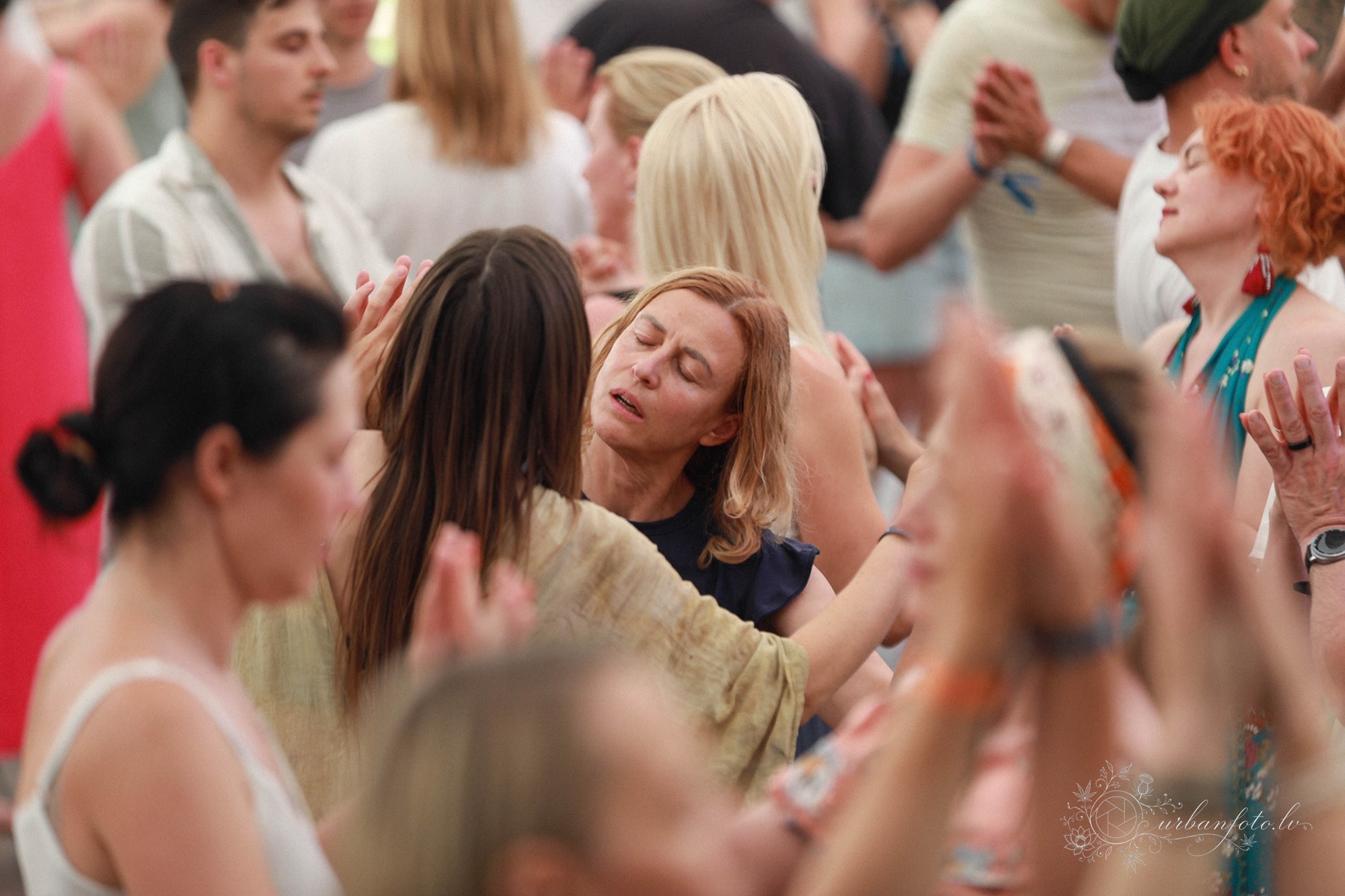 Festival-goers moving in meditation with the music during a mindful dance gathering at BŪTĪBA Festival 2026